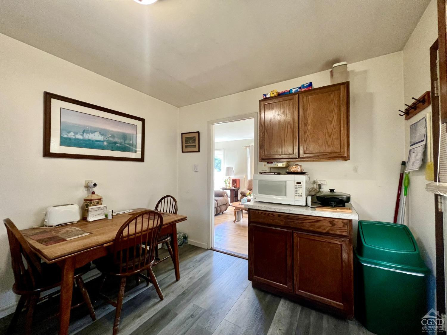 174 Middlefield Road Cairo, NY 12058 - Photo 8 of 22 a kitchen with granite countertop a sink appliances and cabinets