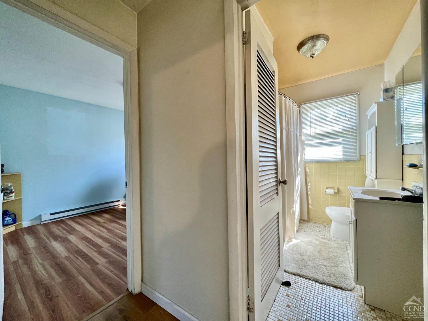 174 Middlefield Road Cairo, NY 12058 - Photo 10 of 22 a view of a bathroom from a corridor