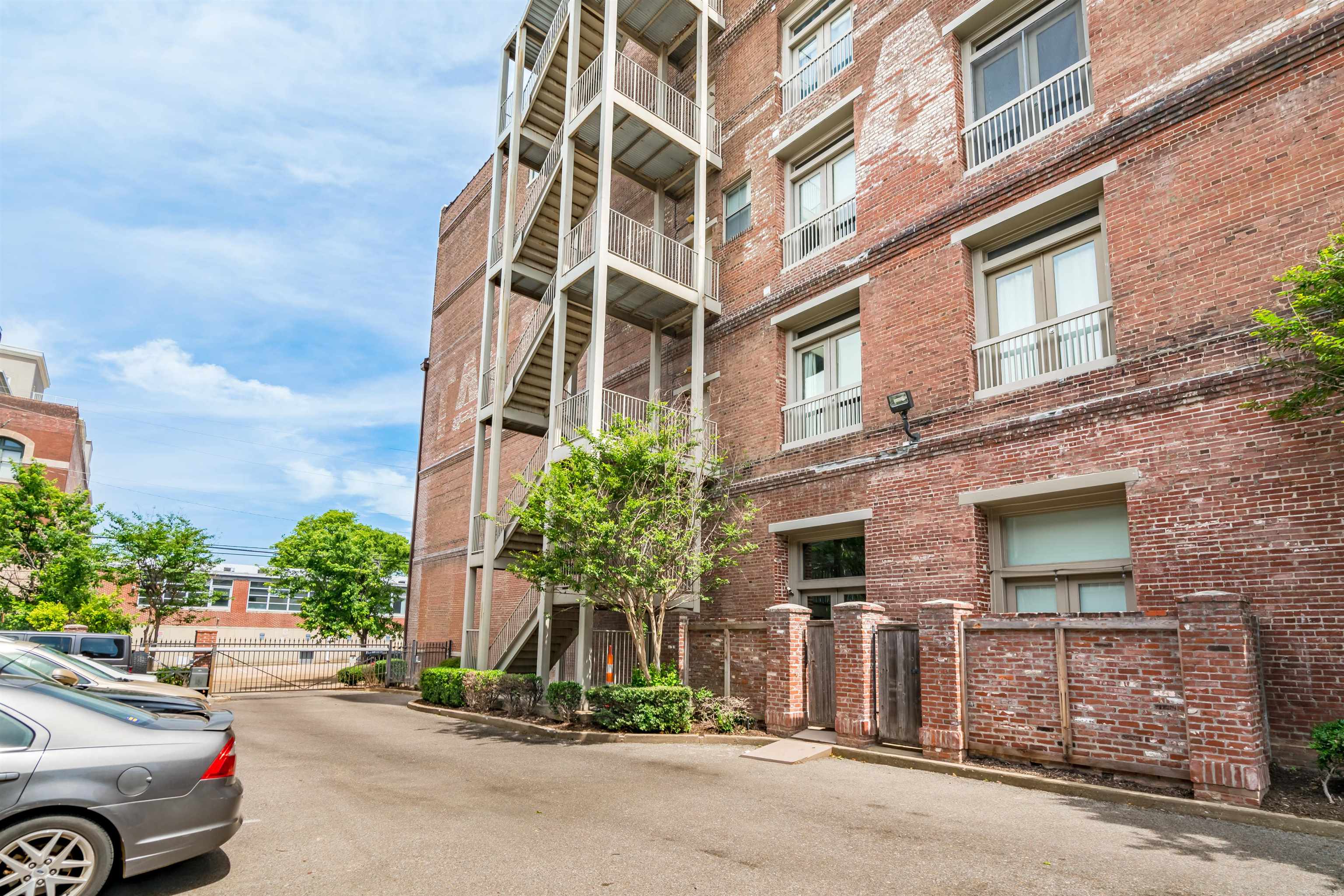 420 South Front Street, Unit 104 Memphis, TN 38103 - Photo 3 of 25 front view of a building with a street
