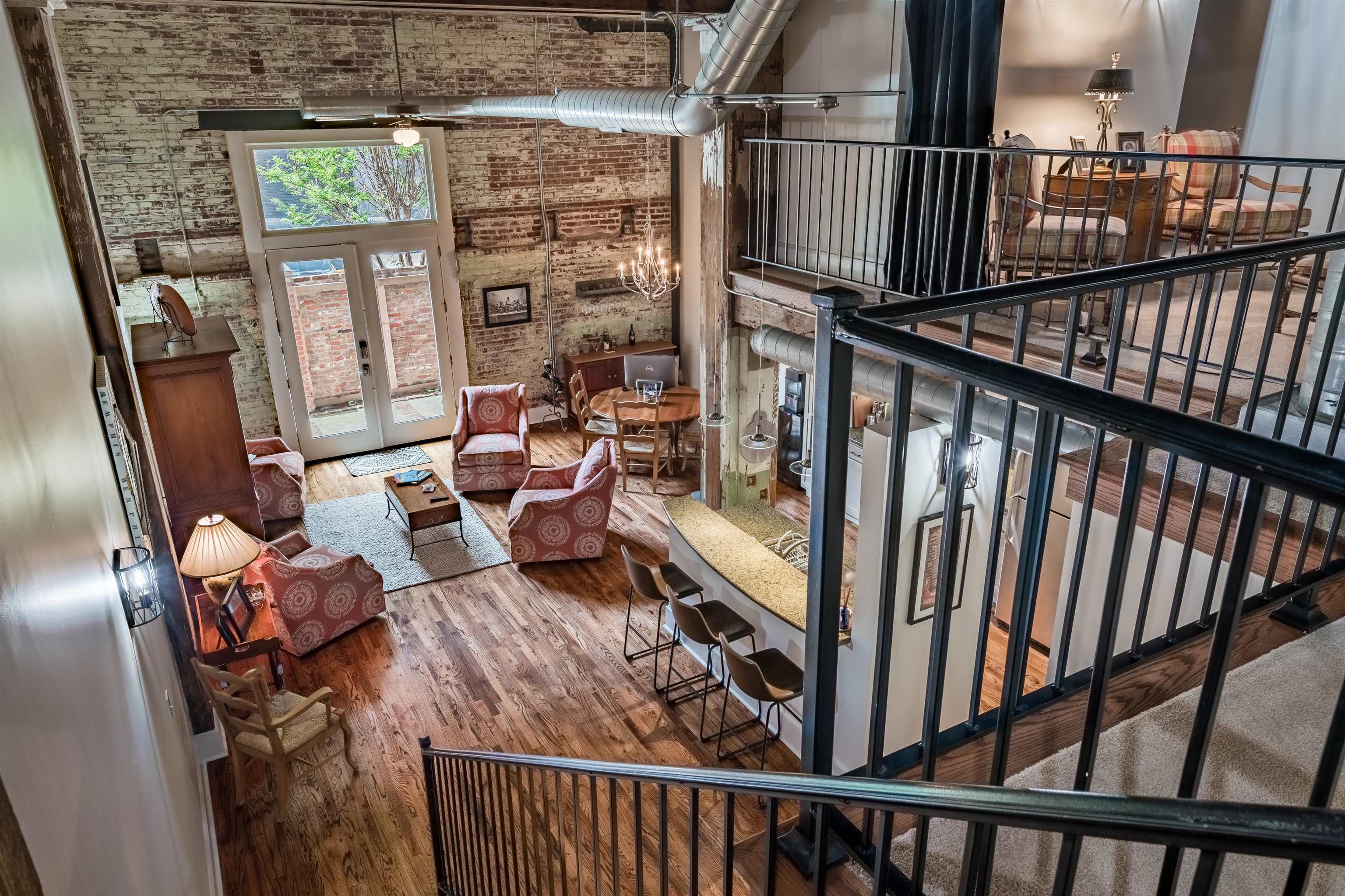420 South Front Street, Unit 104 Memphis, TN 38103 - Photo 5 of 25 a view of living room kitchen and entryway