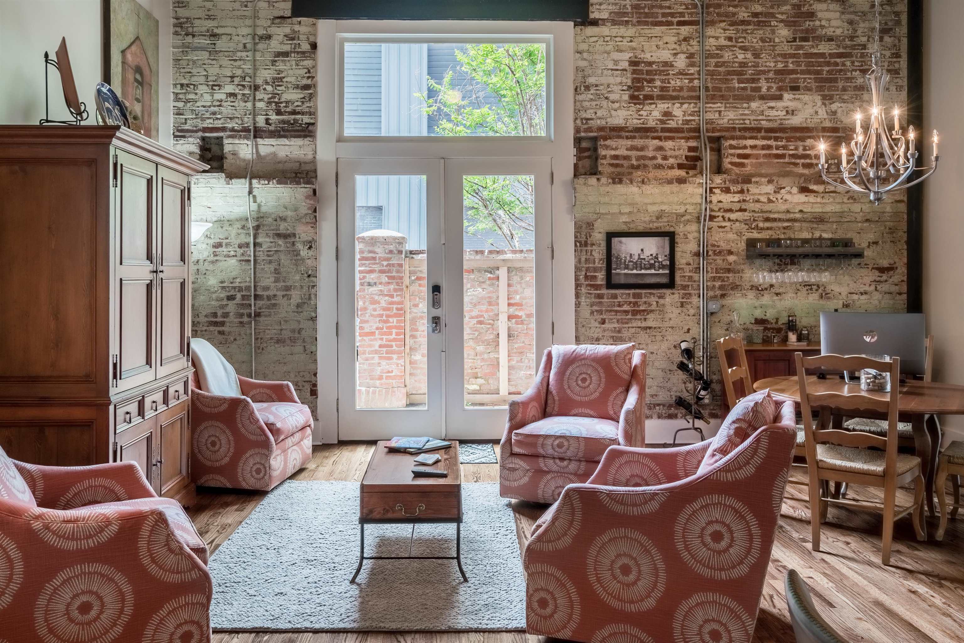 420 South Front Street, Unit 104 Memphis, TN 38103 - Photo 6 of 25 a living room with furniture and a fireplace