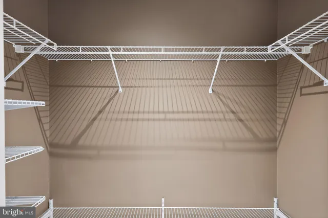 a bathroom with a sink mirror toilet and bathtub