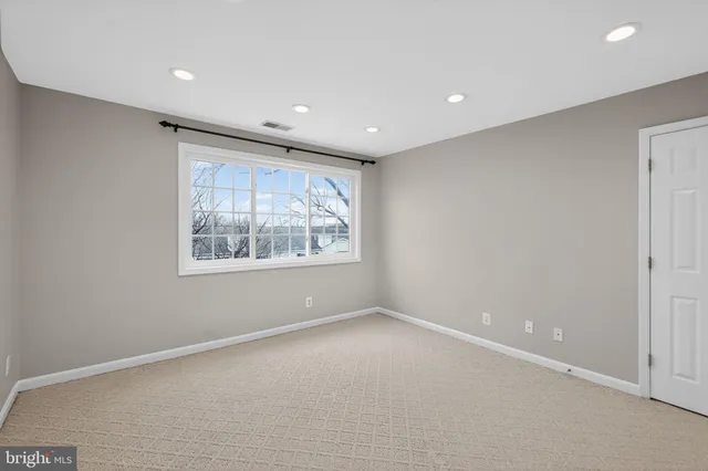 a view of a park slide and slide