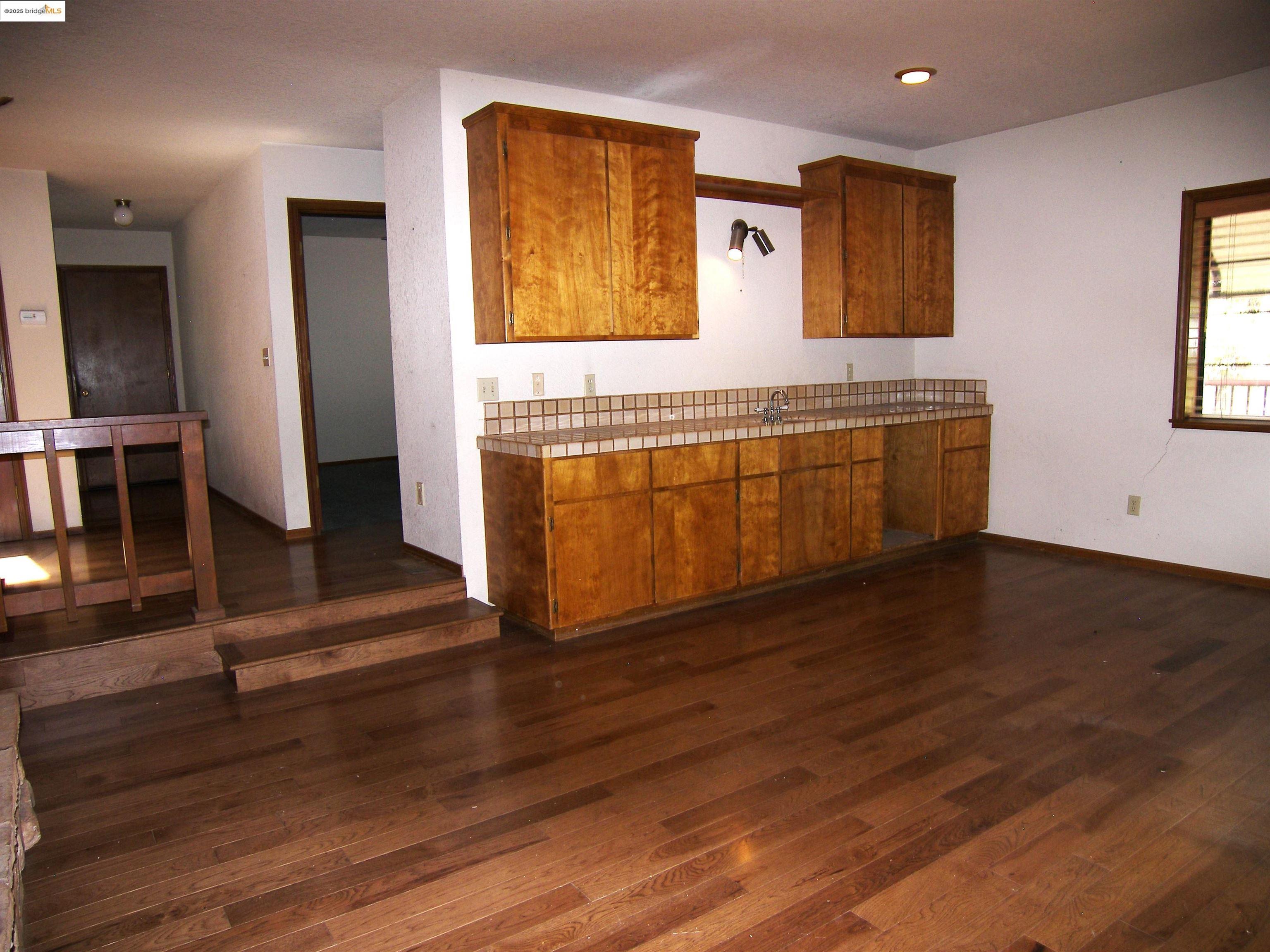 19195 Ferretti Road Groveland, CA 95321 - Photo 43 of 51 a view of kitchen with wooden floor and electronic appliances