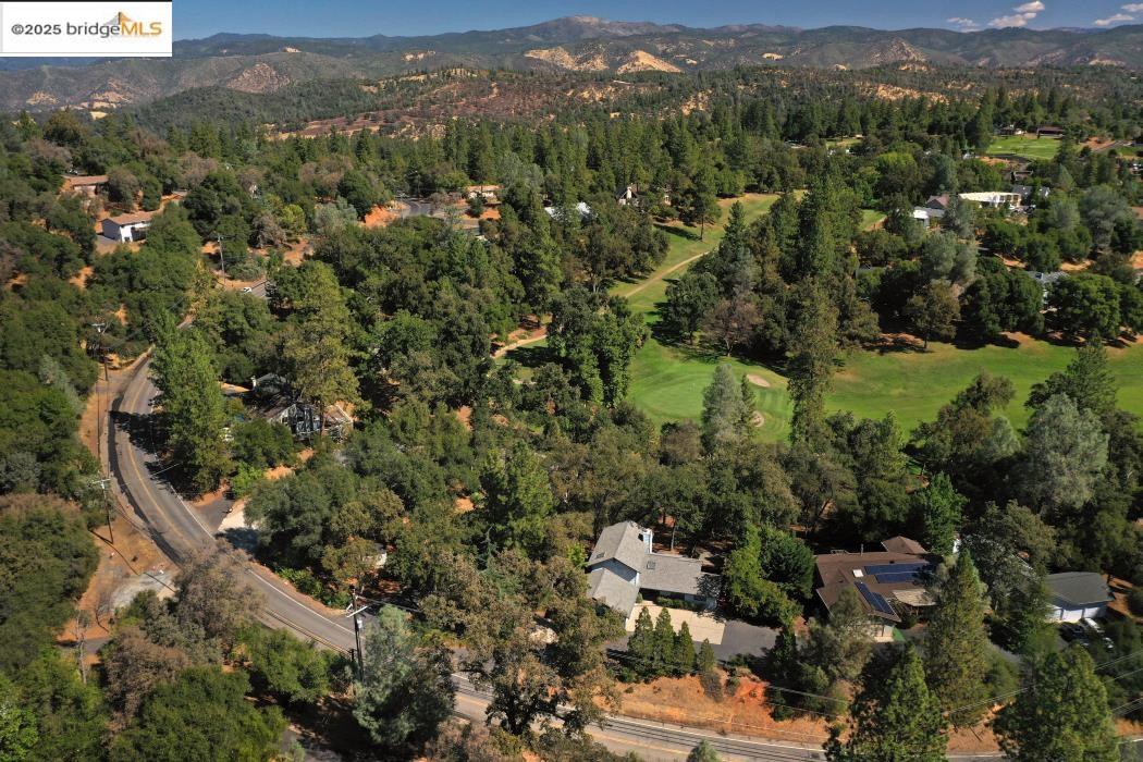 19195 Ferretti Road Groveland, CA 95321 - Photo 50 of 51 Aerial view of property and surrounding area with mountains