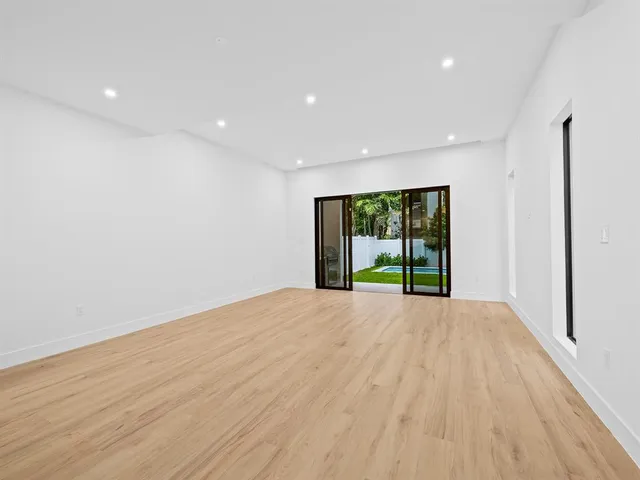 a bathroom with a sink and a large mirror