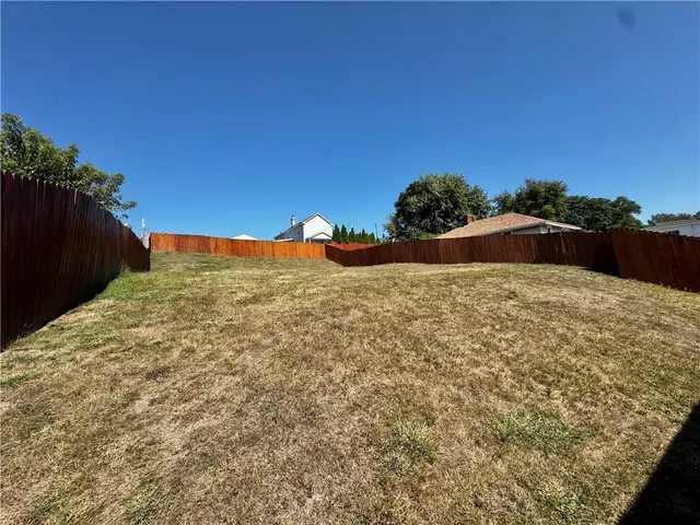 a view of outdoor space and yard