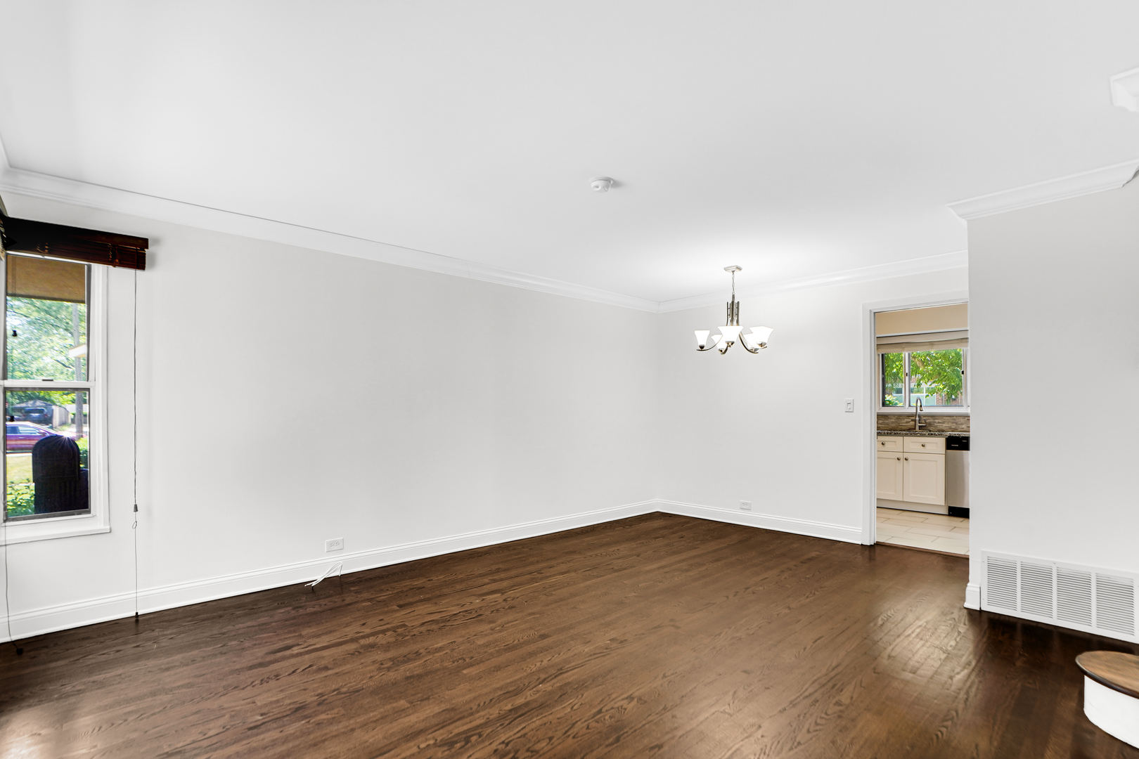 503 Ridge Road, Unit 21 Wilmette, IL 60091 - Photo 20 of 21 a view of a room with wooden floor and a window