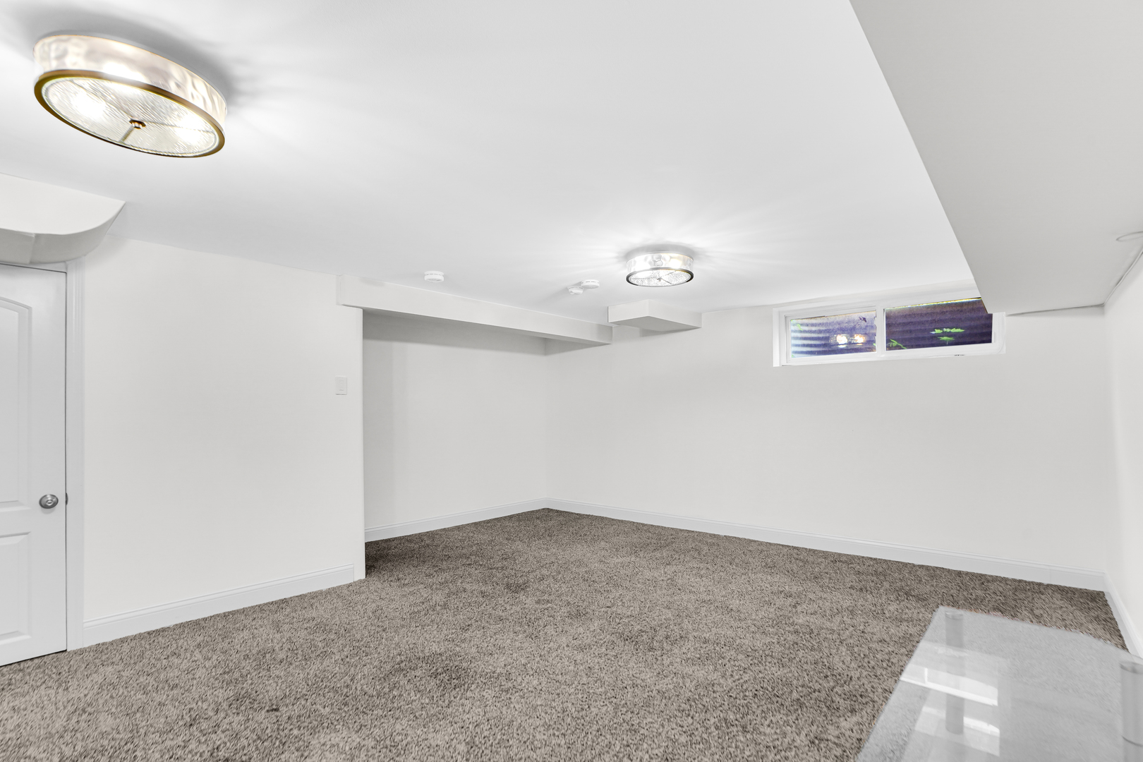 503 Ridge Road, Unit 21 Wilmette, IL 60091 - Photo 5 of 21 an empty room with wooden floor and windows