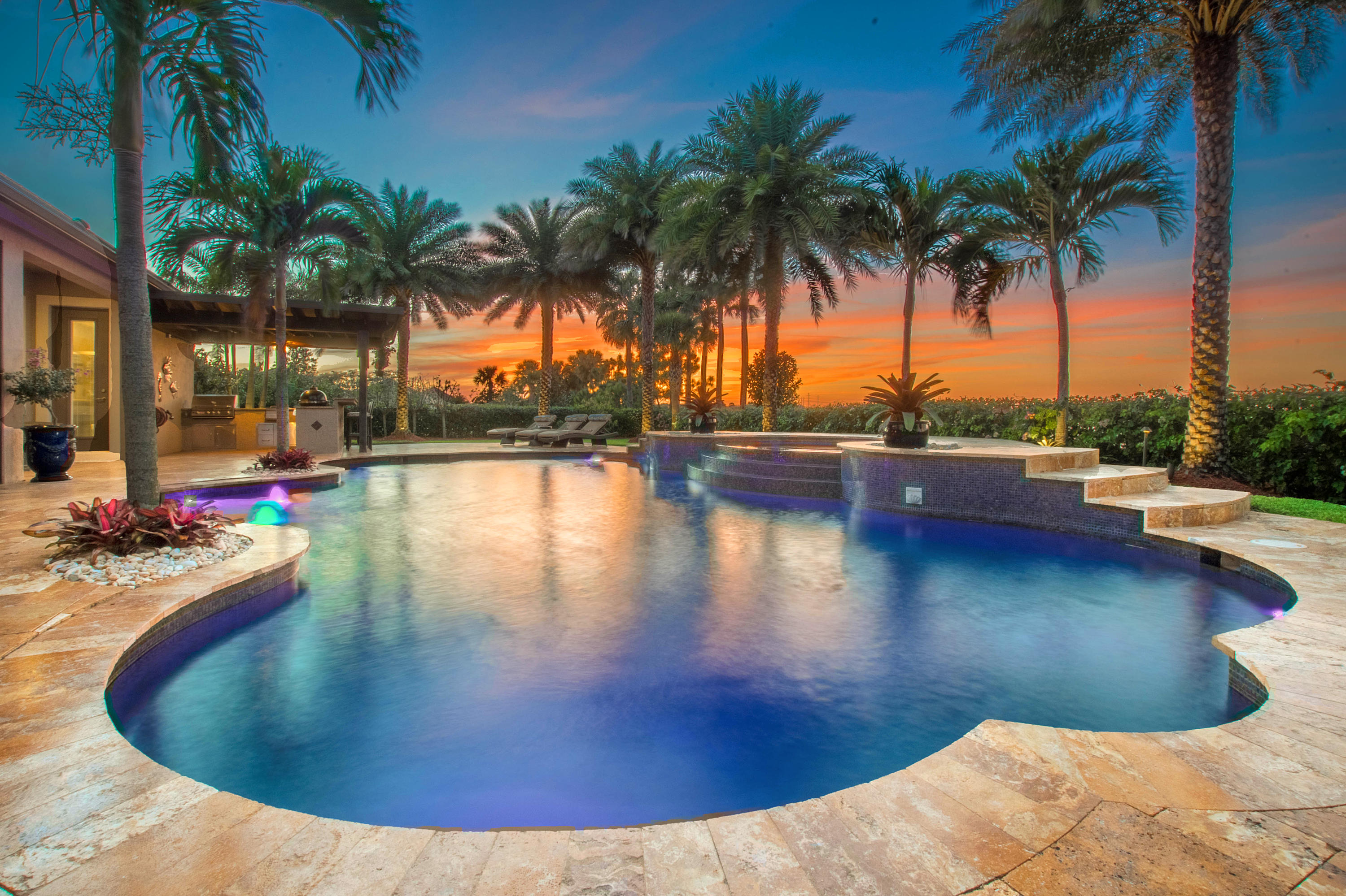 10817 Pisa Road Wellington, FL 33414 - Photo 1 of 30 Custom Heated Salt Water Pool at Sunset