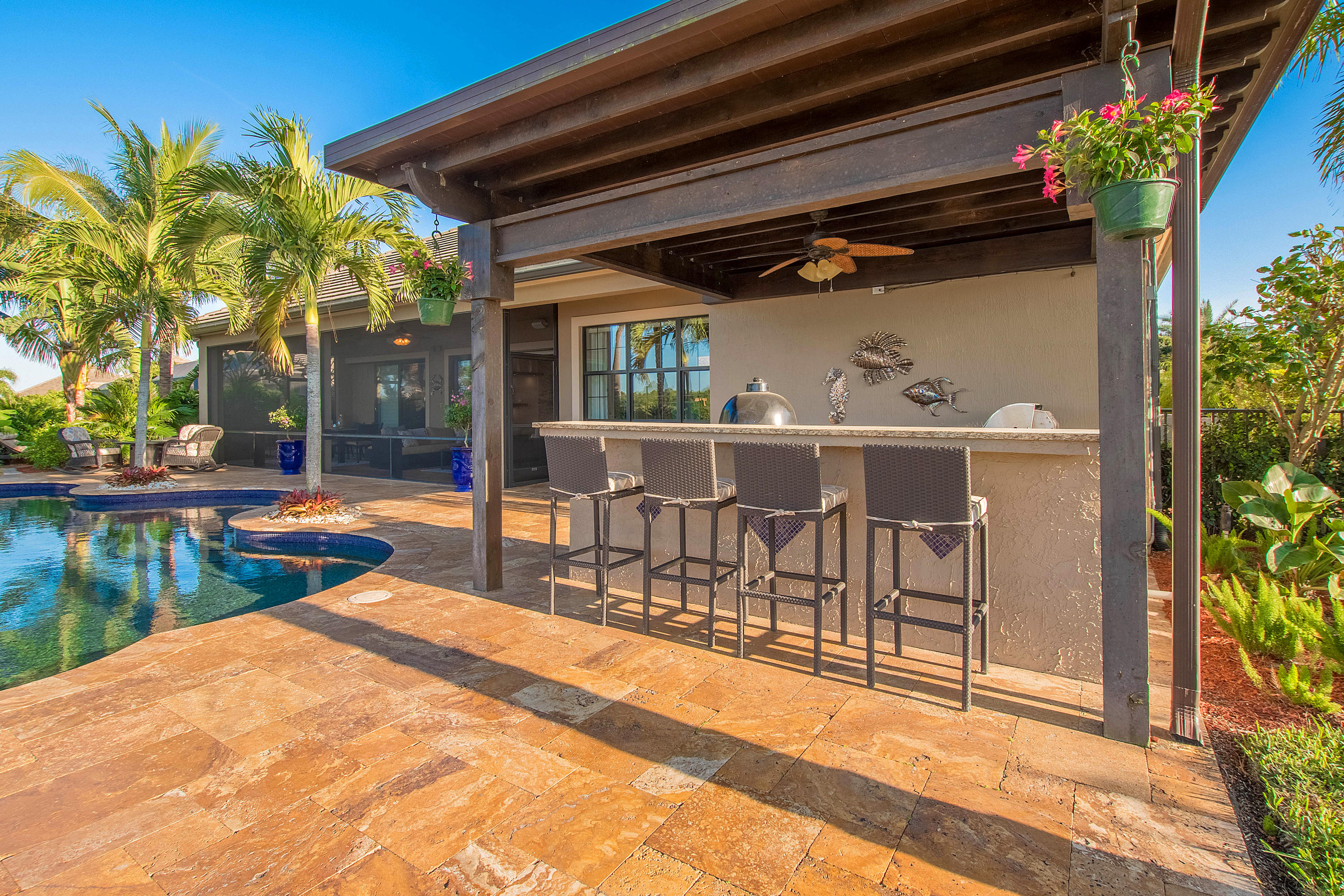 10817 Pisa Road Wellington, FL 33414 - Photo 26 of 30 Covered Outdoor Kitchen and Bar Area