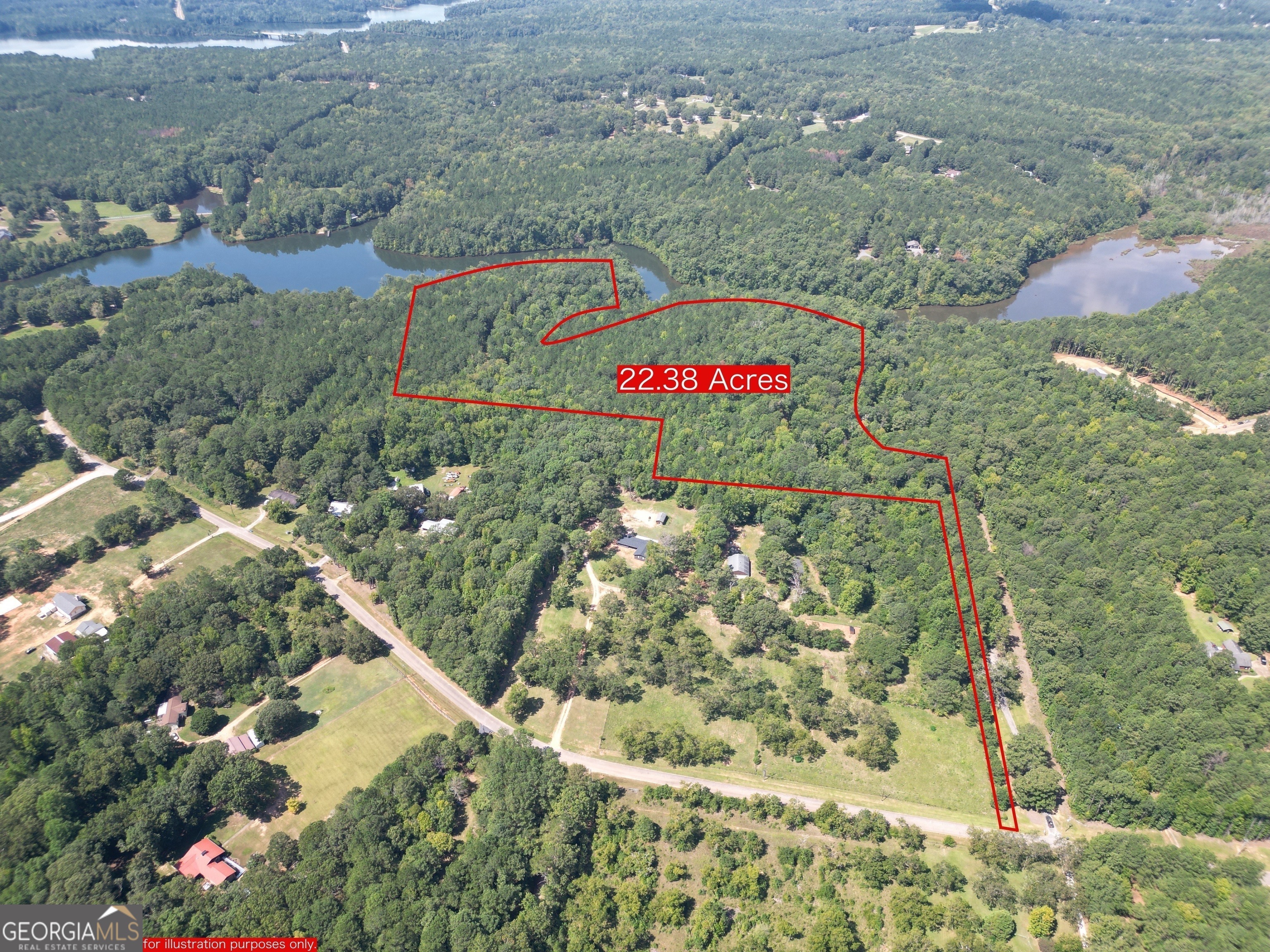 584 Moccasin Gap Road Jackson, GA 30233 - Photo 4 of 10 an aerial view of residential house with outdoor space