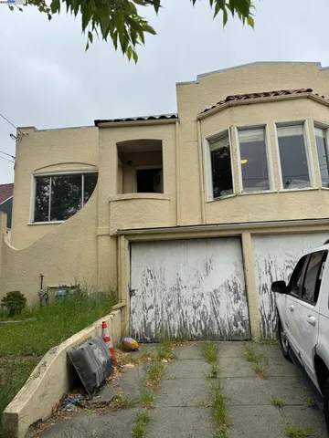 a view of a house with a garden