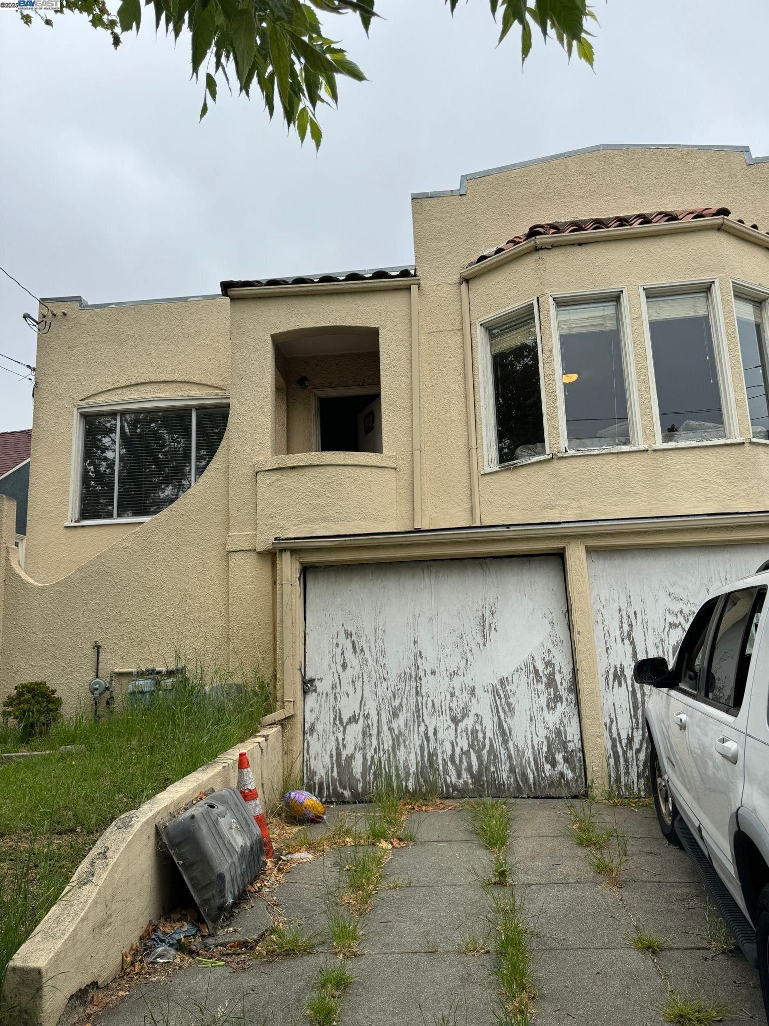 2123 High Street Oakland, CA 94601 - Photo 3 of 14 a view of a house with a garden