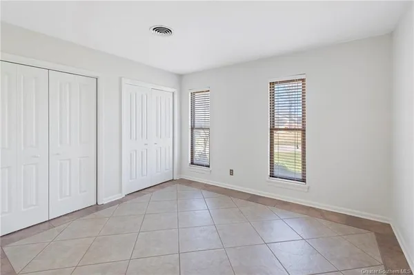 $257,500 | 1619 South Whispering Woods Drive, Lake Charles, LA 70605