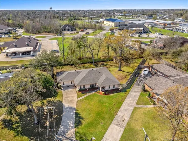 $257,500 | 1619 South Whispering Woods Drive, Lake Charles, LA 70605