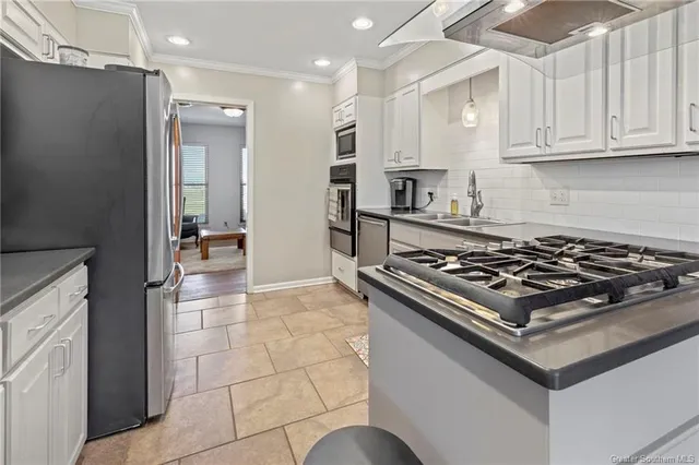 $274,500 | 1619 South Whispering Woods Drive, Lake Charles, LA 70605