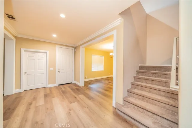 a bathroom with a toilet a sink and a mirror