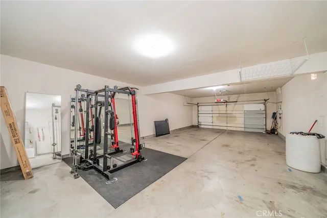 a kitchen with stainless steel appliances granite countertop a stove and a refrigerator