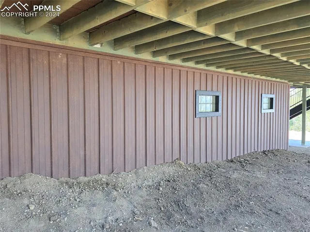 a view of a backyard of the house