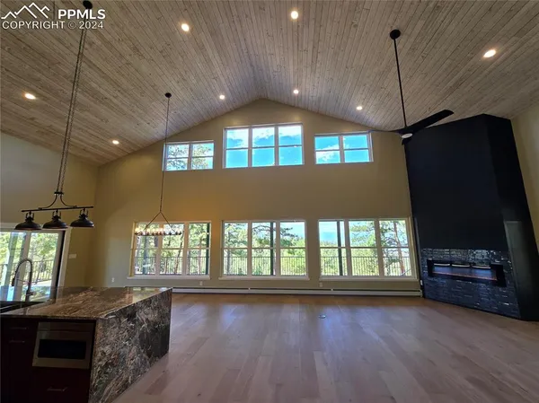 a view of a livingroom with a large window