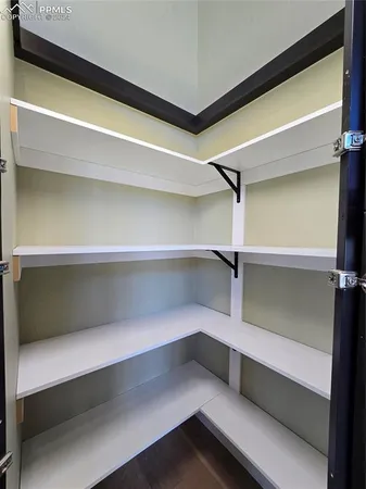 a stove top oven sitting inside of a kitchen