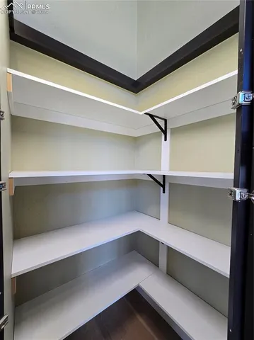 a stove top oven sitting inside of a kitchen