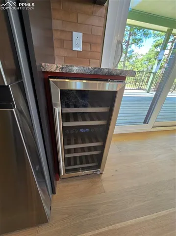 a kitchen with sink a stove and refrigerator