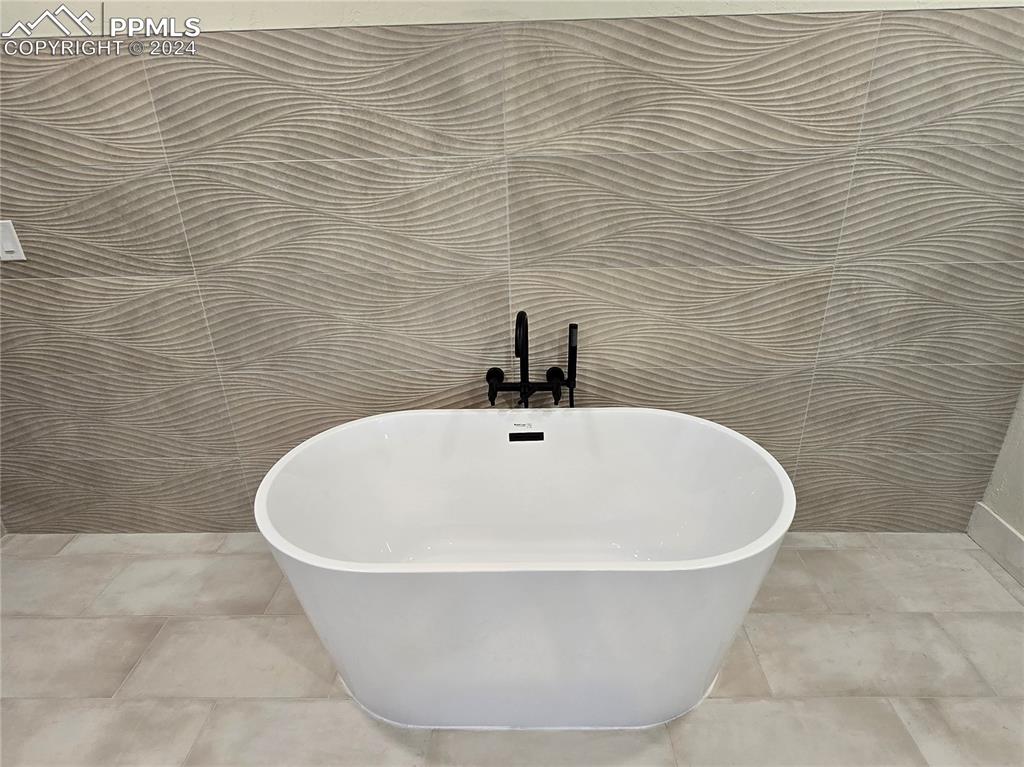 33036 Meadow Ridge Lane Trinidad, CO 81082 - Photo 42 of 50 a white tub sitting in a bathroom