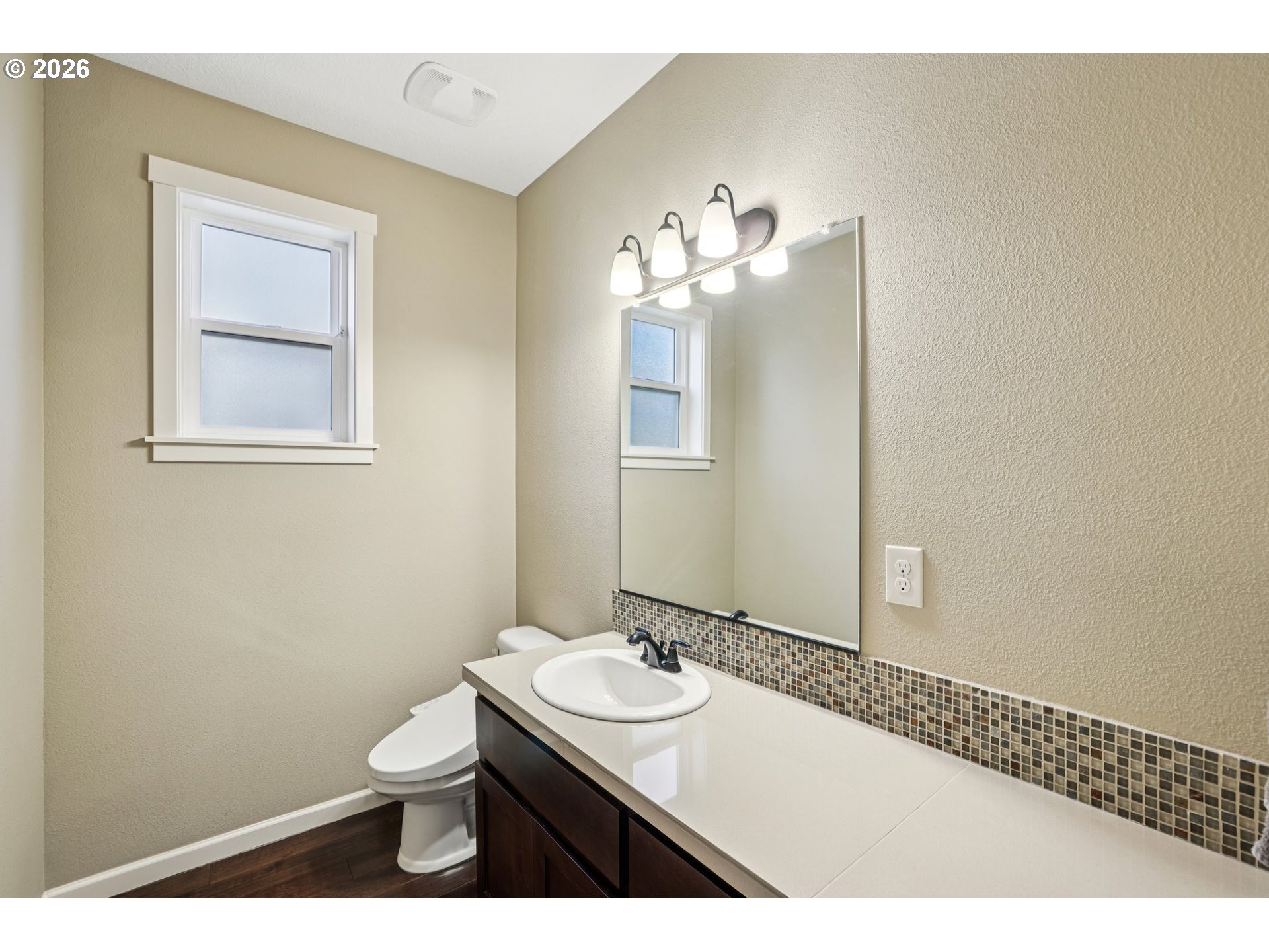 2117 Southeast Cochran Drive Gresham, OR 97080 - Photo 23 of 48 a bathroom with a sink and a mirror