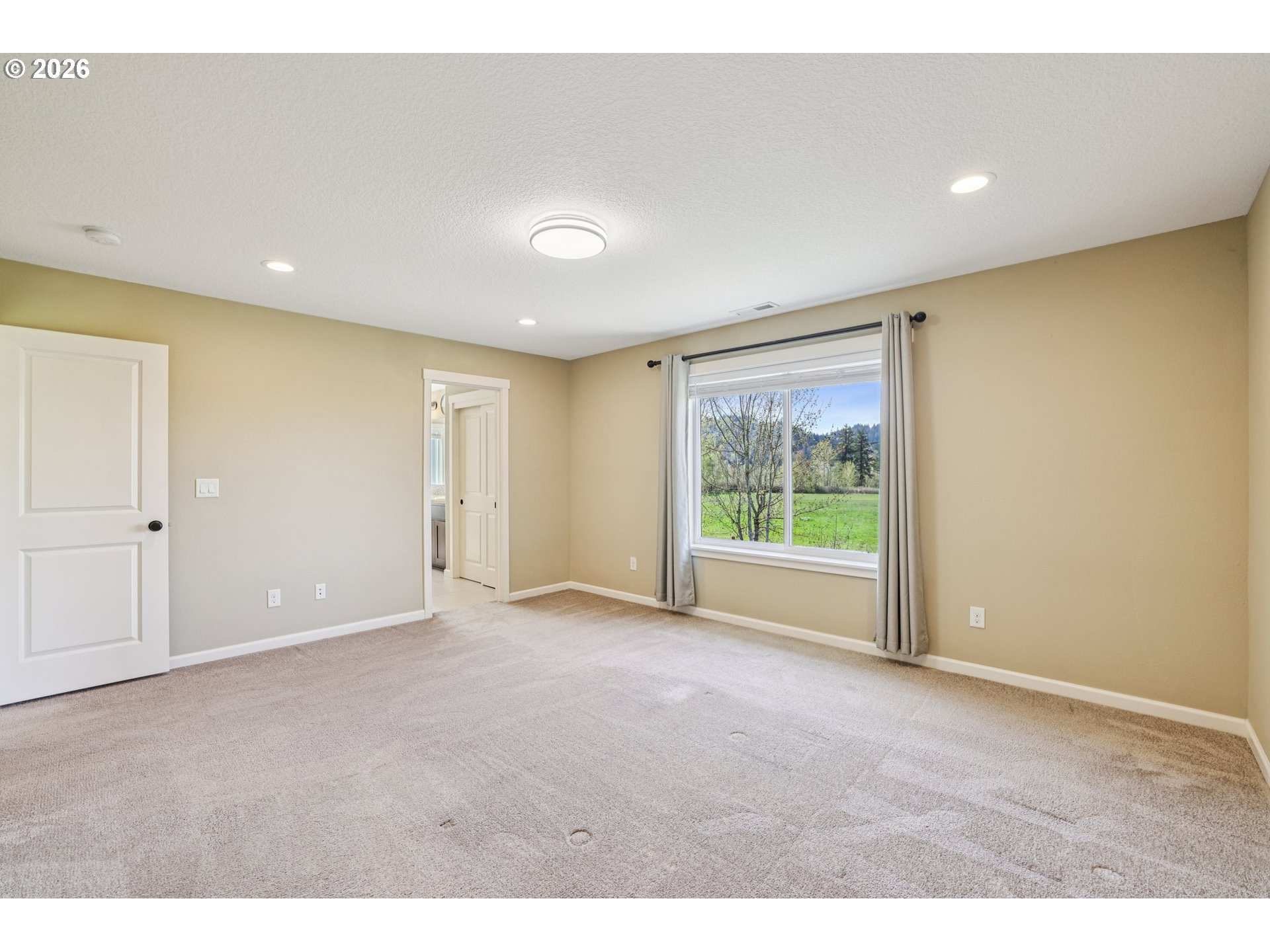 2117 Southeast Cochran Drive Gresham, OR 97080 - Photo 26 of 48 a view of an empty room with a window