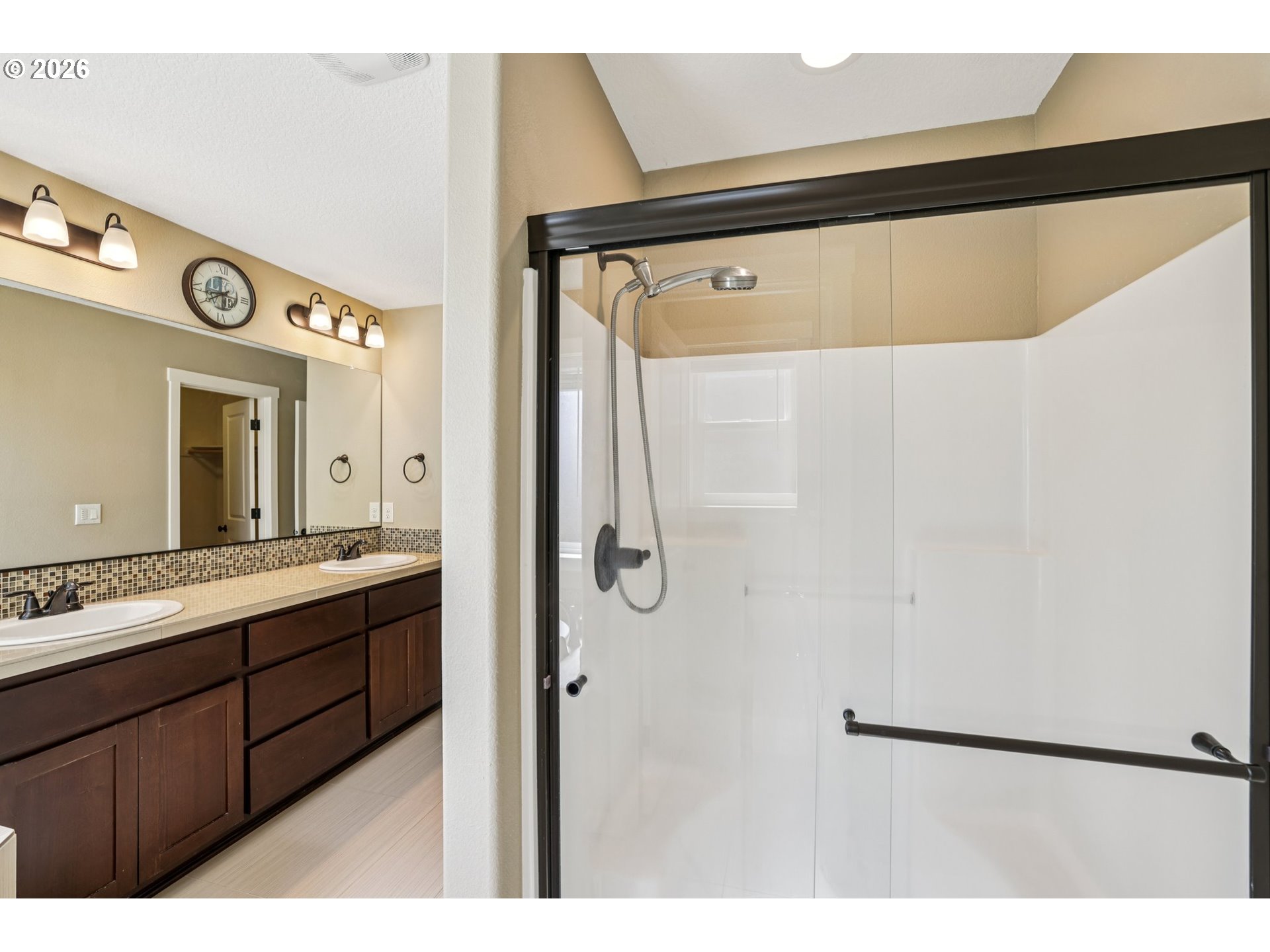 2117 Southeast Cochran Drive Gresham, OR 97080 - Photo 29 of 48 a bathroom with a shower and a sink