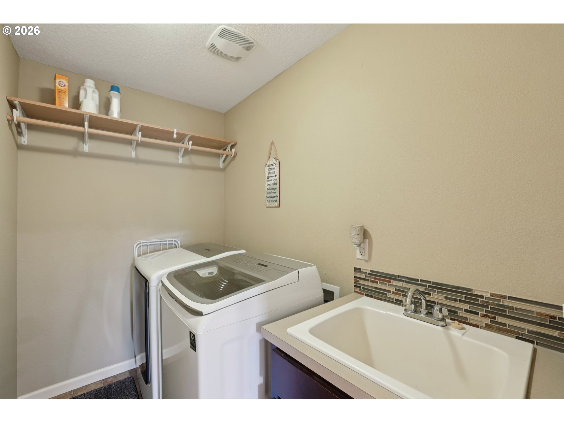 2117 Southeast Cochran Drive Gresham, OR 97080 - Photo 33 of 48 a bathroom with a sink and a mirror