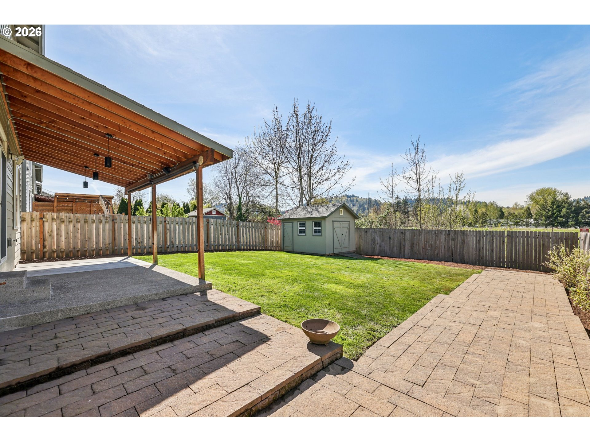 2117 Southeast Cochran Drive Gresham, OR 97080 - Photo 43 of 48 a view of a backyard with wooden fence