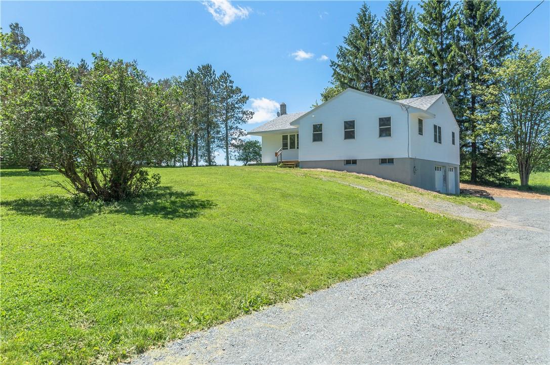 6127 State Rte 55 Liberty, NY 12754 - Photo 1 of 1 a front view of a house with a yard