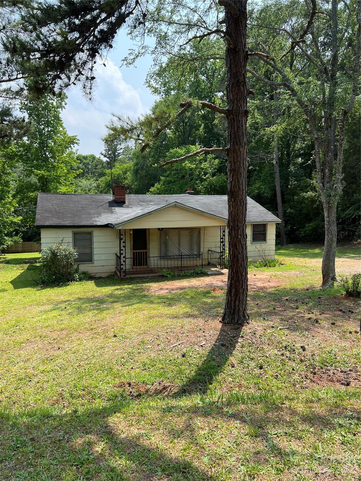 4425 Georges Bridge Road Sharon, SC 29742 - Photo 1 of 6 a front view of a house with yard and green space