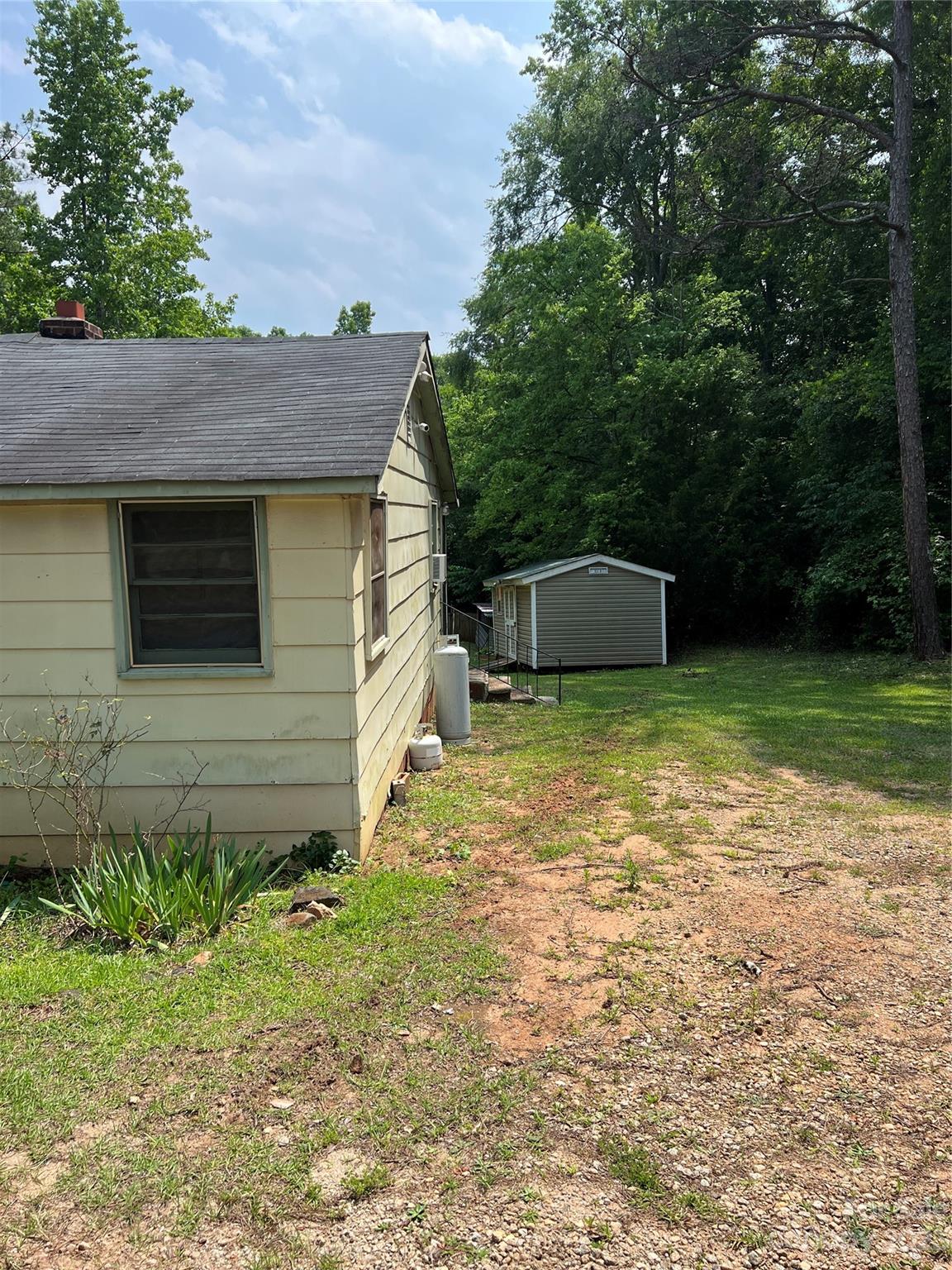 4425 Georges Bridge Road Sharon, SC 29742 - Photo 5 of 6 a view of a backyard with a garden