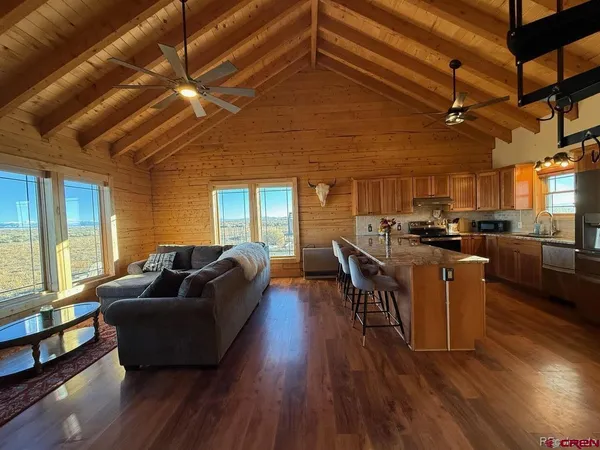 a view of a patio with wooden floor