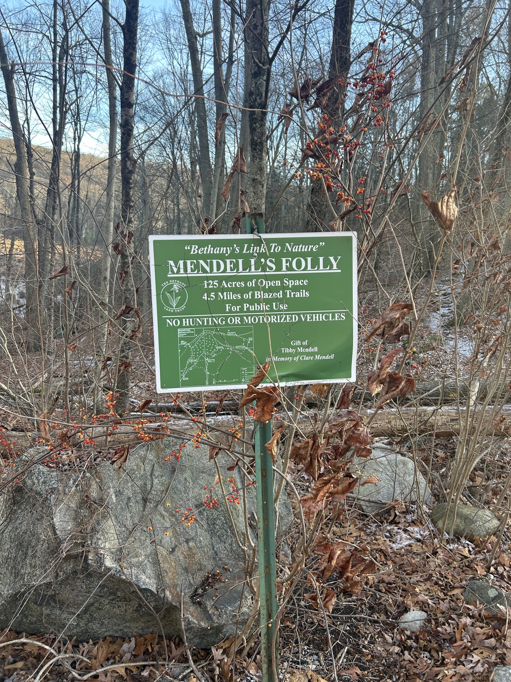 211 Lasky Road Beacon Falls, CT 06403 - Photo 4 of 7 a sign on the side of the road