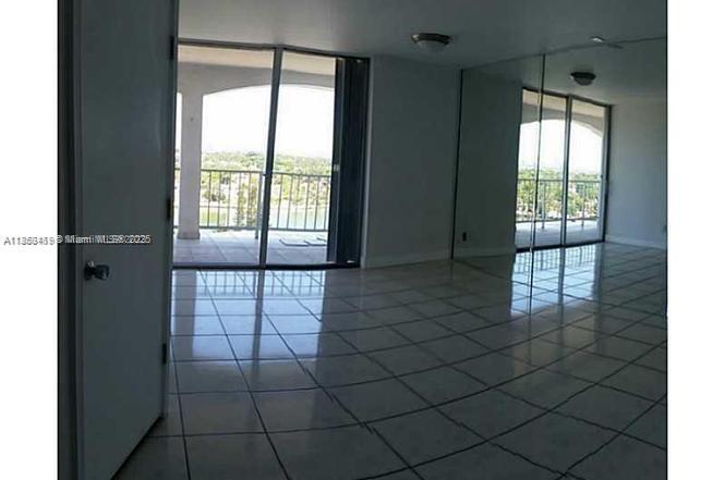 5401 Collins Avenue, Unit 829 Miami Beach, FL 33140 - Photo 21 of 29 a view of empty room
