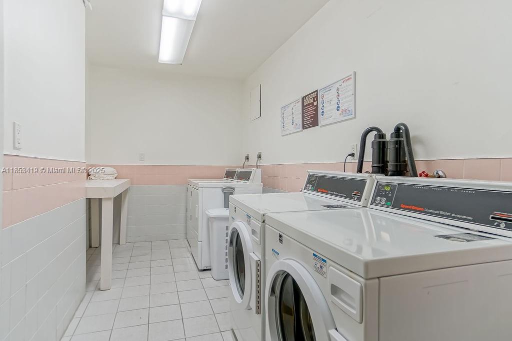 5401 Collins Avenue, Unit 829 Miami Beach, FL 33140 - Photo 26 of 29 a utility room with dryer and washer