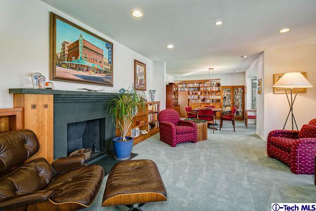 1270 Wynn Road Pasadena, CA 91107 - Photo 17 of 37 a living room with furniture a fireplace and a flat screen tv