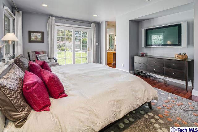 1270 Wynn Road Pasadena, CA 91107 - Photo 20 of 37 a bedroom with a bed and a flat screen tv