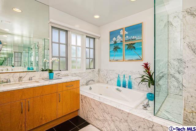 1270 Wynn Road Pasadena, CA 91107 - Photo 23 of 37 a bathroom with a tub sink and mirror