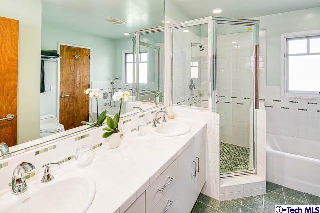 1270 Wynn Road Pasadena, CA 91107 - Photo 25 of 37 a bathroom with a double vanity sink mirror and shower