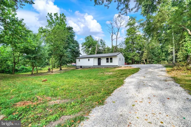 a house view with a garden space