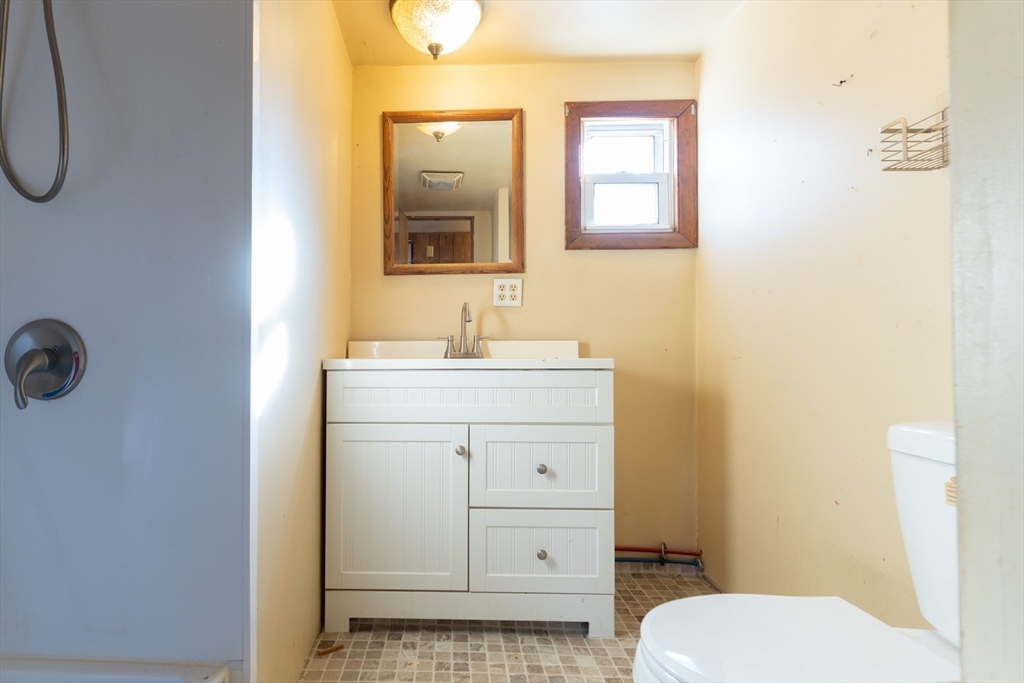 238 Brookfield Road Brimfield, MA 01010 - Photo 17 of 28 a bathroom with a sink a toilet and shower