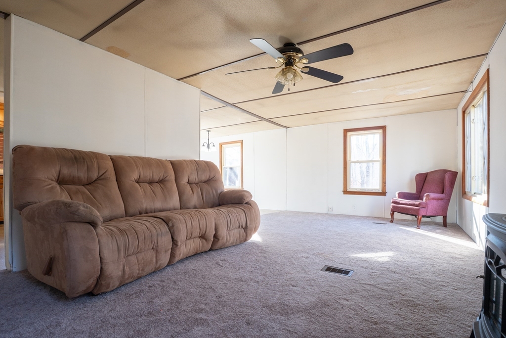 238 Brookfield Road Brimfield, MA 01010 - Photo 6 of 28 a living room with furniture and a window