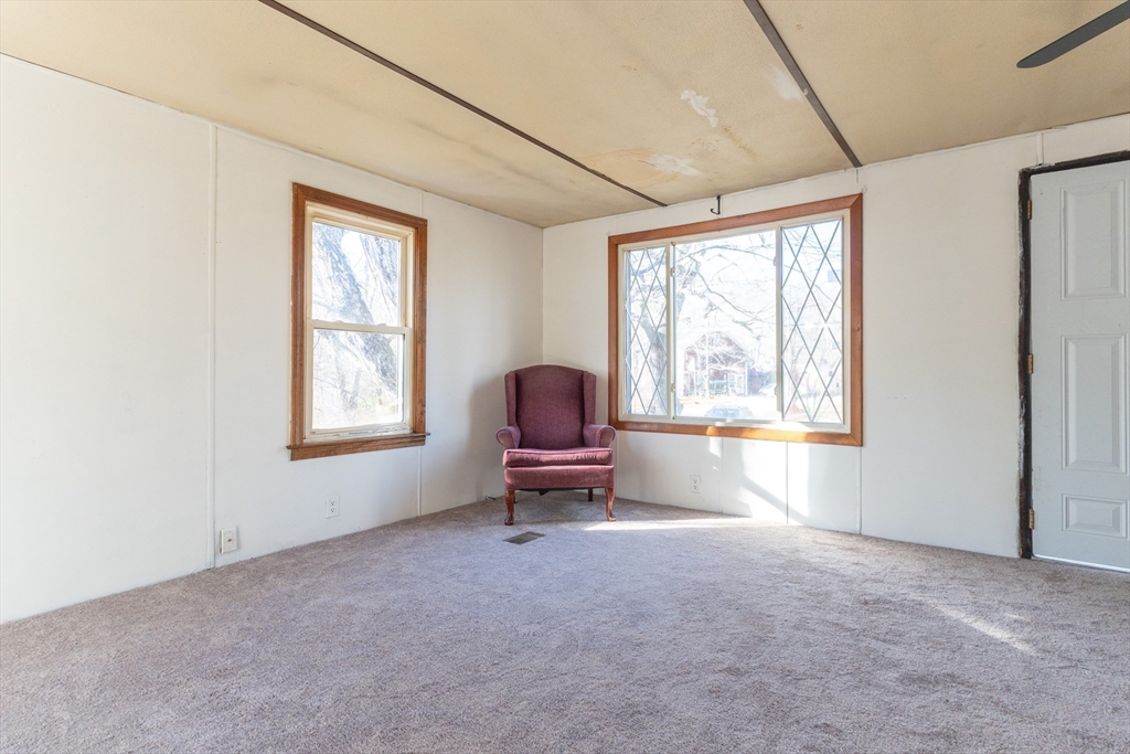 238 Brookfield Road Brimfield, MA 01010 - Photo 7 of 28 a living room with furniture and a window
