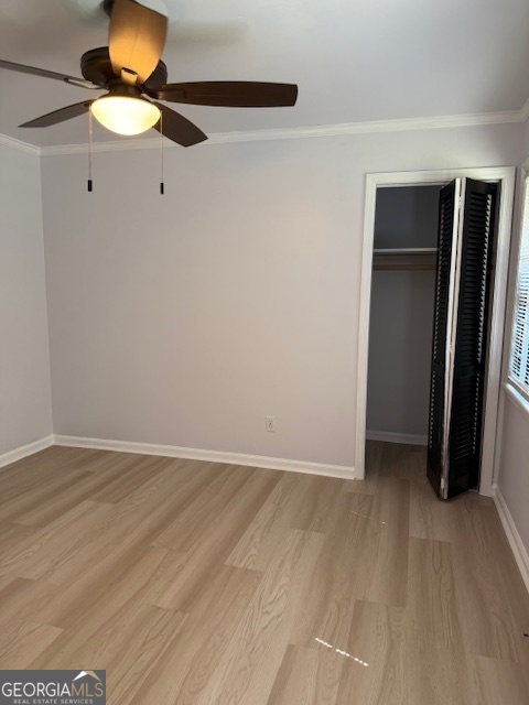 4405 Bakers Ferry Road Southwest Atlanta, GA 30331 - Photo 13 of 18 a view of an empty room with window and wooden floor